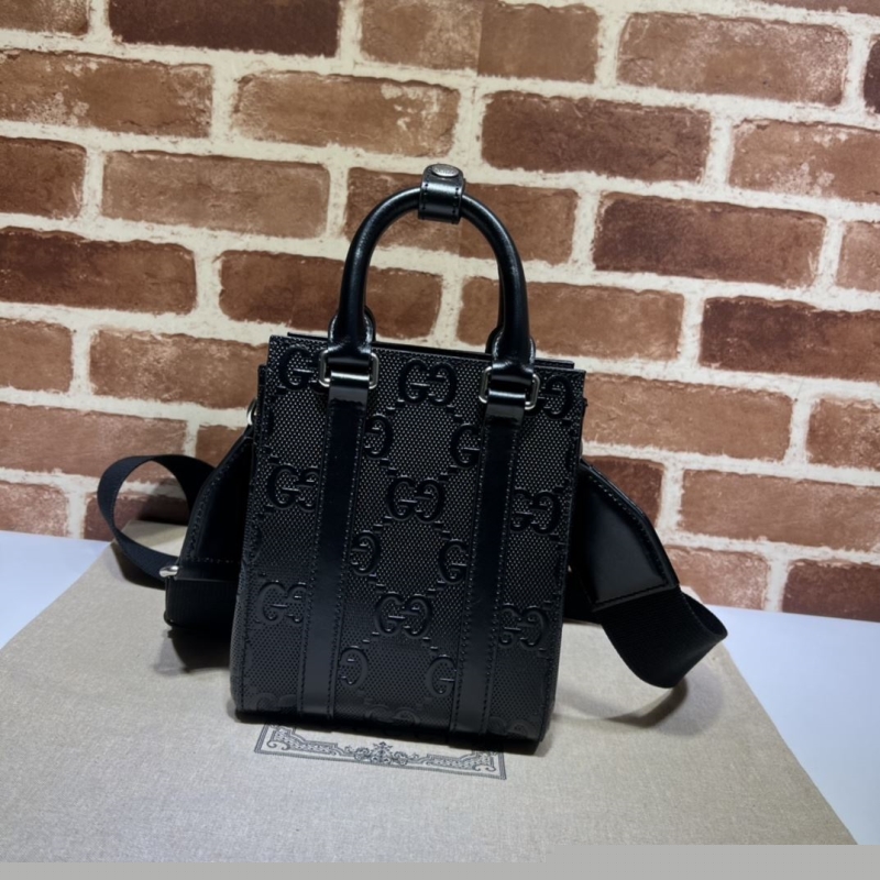 G*u*i top handle bags